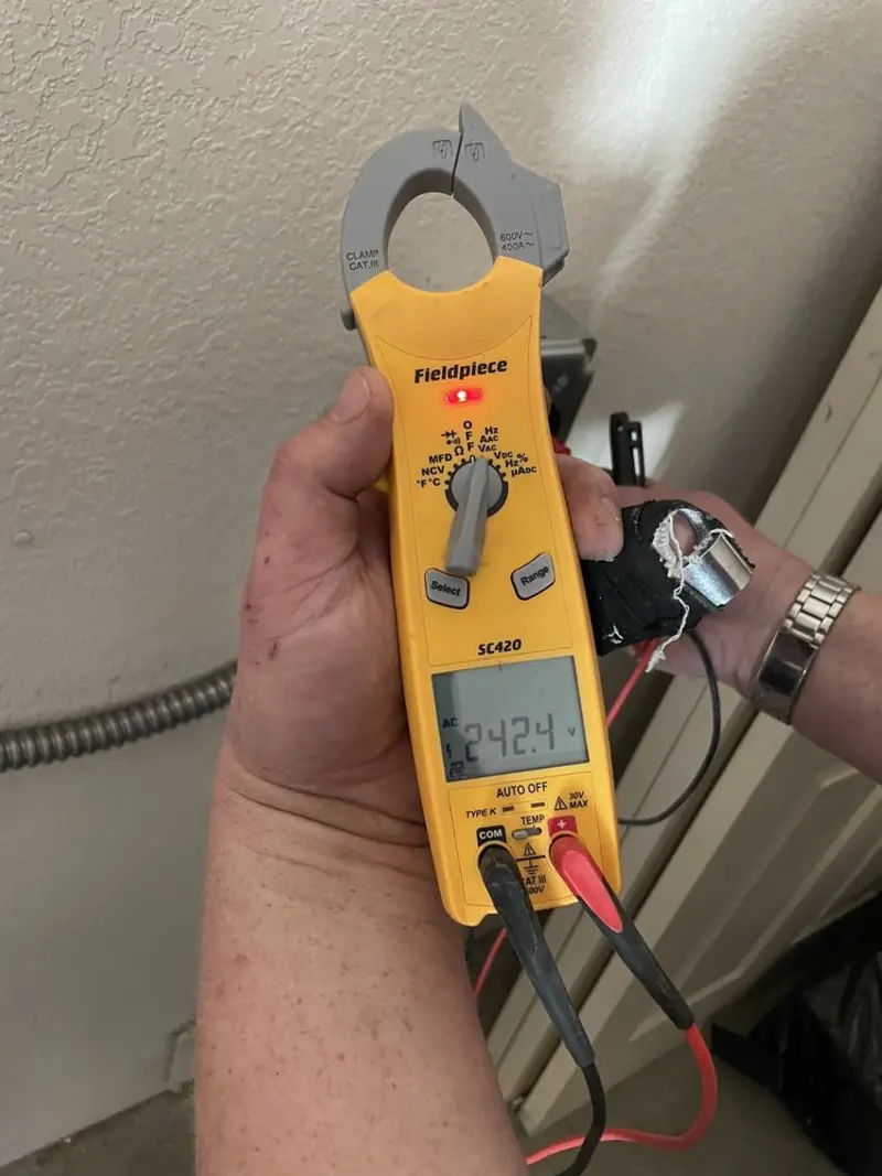 Voltage testing with clamp meter during Electrical Installation Services in Madera Acres
